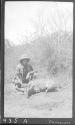 Pat Ayre with dead horned animal, African Safari