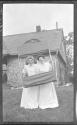 Josephine Dickman and Marie Willard holding box kite, Oak Lodge Trip