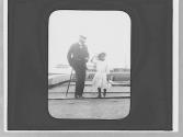 Man & girl on railroad tracks, West Indies Trip