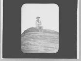 George Eastman sitting on rock, Arizona Trip