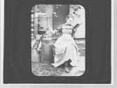 Girl reading & churning