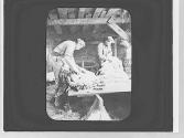 Men shearing sheep
