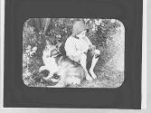 Boy with flute & a dog