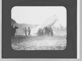 Men pushing an airplane