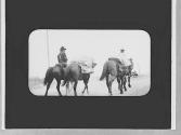 Riders on a road, Wyoming Trip