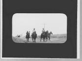 Riders on a road, Wyoming Trip