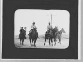 Riders on a road, Wyoming Trip