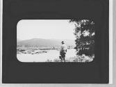 Man with pail, Wyoming Trip