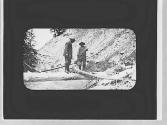 Men on a log, Wyoming Trip