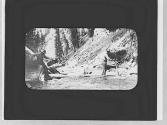 Men crossing a stream, Wyoming Trip