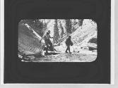 Men crossing a stream, Wyoming Trip