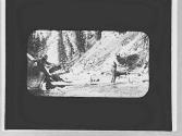 Men crossing a stream, Wyoming Trip