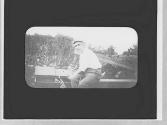 Edward Mulligan with golf clubs