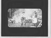 George Eastman at table at campsite, Grand Cascapedia Trip