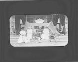 George Eastman and guests on porch, Oak Lodge Trip