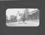 George Eastman and Josephine Dickman horseback riding, Oak Lodge Trip