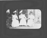 Marie Willard, May Gifford and Josephine Dickman on porch, Oak Lodge Trip