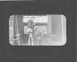 Ernest Willard and Frank Macomber on porch, Oak Lodge Trip