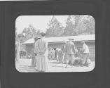 George Eastman and people in yard, Oak Lodge Trip