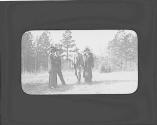 George Eastman and friends in yard, Oak Lodge Trip