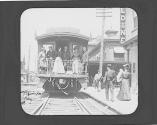 George Eastman and guests on caboose of train, Oak Lodge Trip