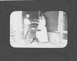 George Eastman and guests arranging flowers, Oak Lodge Trip