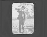 Walter Hubbell drinking from bottle, Oak Lodge Trip