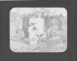 George Eastman and guests inspecting cornerstone of cabin, Oak Lodge Trip
