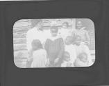 Mary Mulligan and Adelaide Hubbell with African American family, Oak Lodge Trip