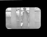 Figure in front of window, Oak Lodge Trip