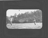 Men playing ball in yard, Oak Lodge Trip