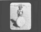 Native warrior posing with shield