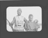 Native man and woman with baby