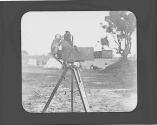 Monkey standing on camera