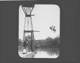 Men jumping into water