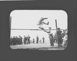 Man jumping high jump