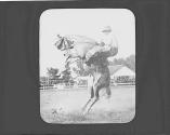 Man on bucking horse