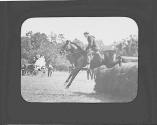 Man jumping horse