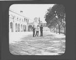 Three policemen on city street