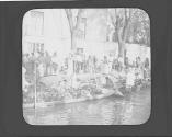 Merchants in boats in city