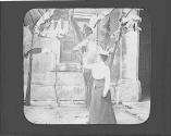 Woman looking at banana plants