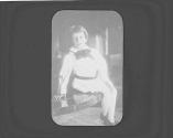 George Eastman Dryden sitting on table