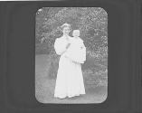Woman in Eastman's garden with Watson Newhall