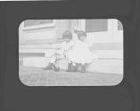 Dryden children playing on steps
