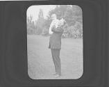 George Eastman holding Watson Newhall