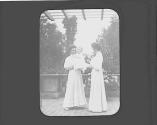 Nell and Watson Newhall in garden with friend, probably Ellen Dryden