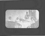 Ellen Dryden and children dining on porch