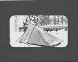 Tent in snowy garden