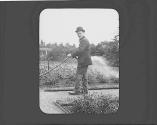 George Eastman's Gardener, William Pirie, watering vegetables