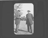 Two men on lawn